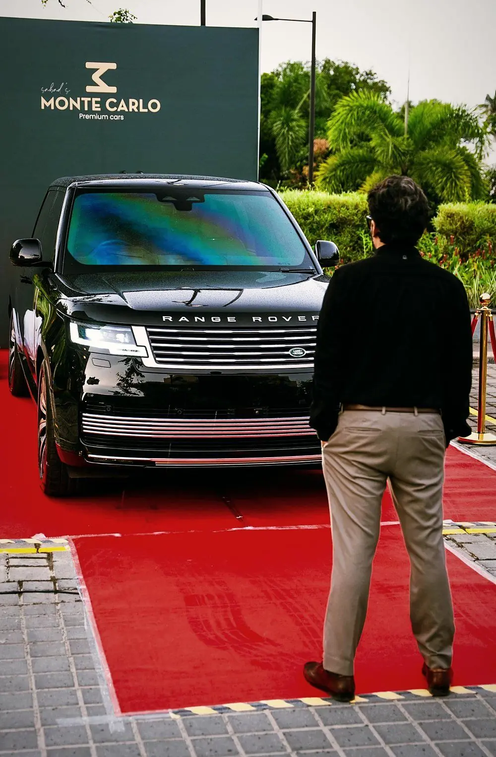 A Range Rover presented beneath the Monte Carlo sign